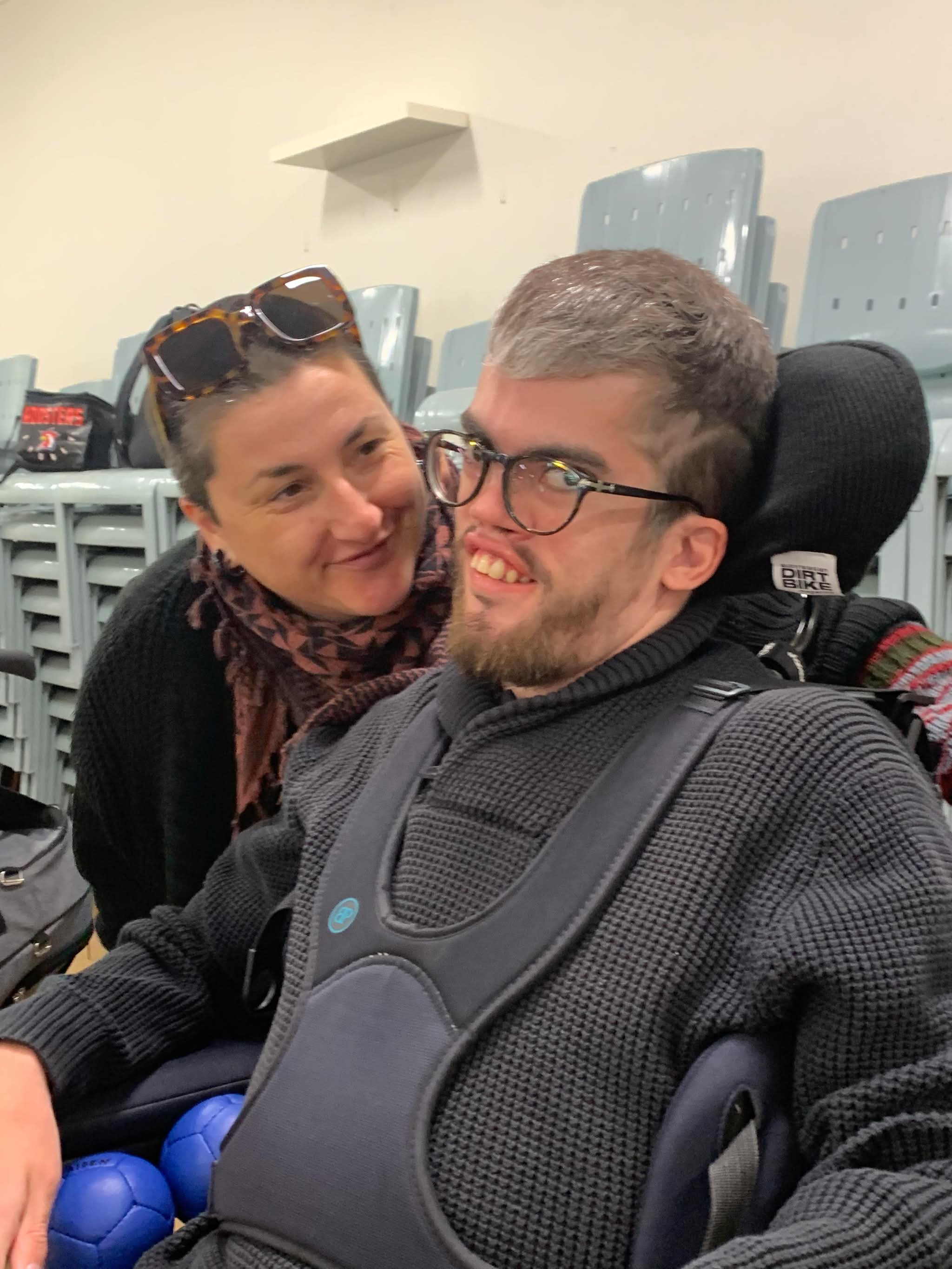 A Rebel and a supporter smiling together